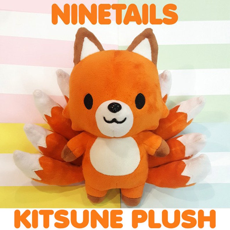 May include: A plush orange fox with nine tails, called a kitsune, with white accents on the face and tails. The plush toy is standing on a striped background with the text "NINETAILS" and "KITSUNE PLUSH" above and below the toy.