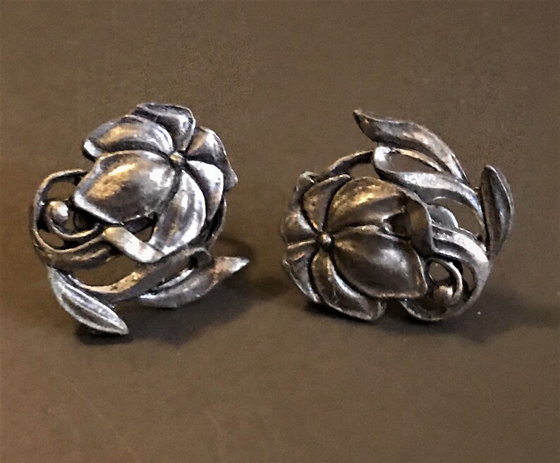 Silver Metal Flower Clip On Earring