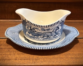 Currier Ives blauwe juskom met dubbele uitloop en onderbord