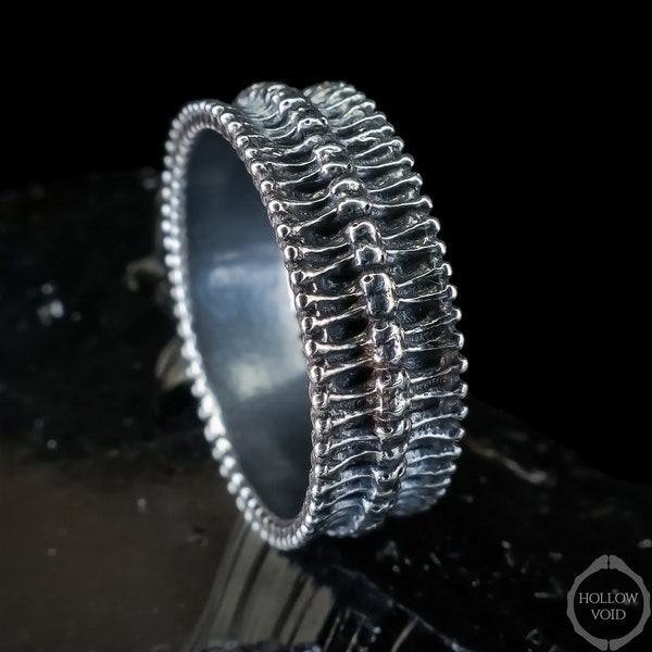 Gothic silver spine ring, bones repeat in this dark HR Giger inspired biomechanical design