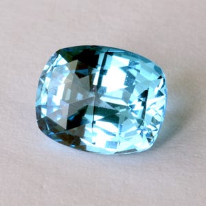 Blue Topaz Gemstone: 4.28 Carat Faceted Cushion Cut, November Birthstone (10.5 x 5.5 )