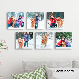 May include: Six square photos of people and dogs in a snowy winter setting. The photos are mounted on white foam board.