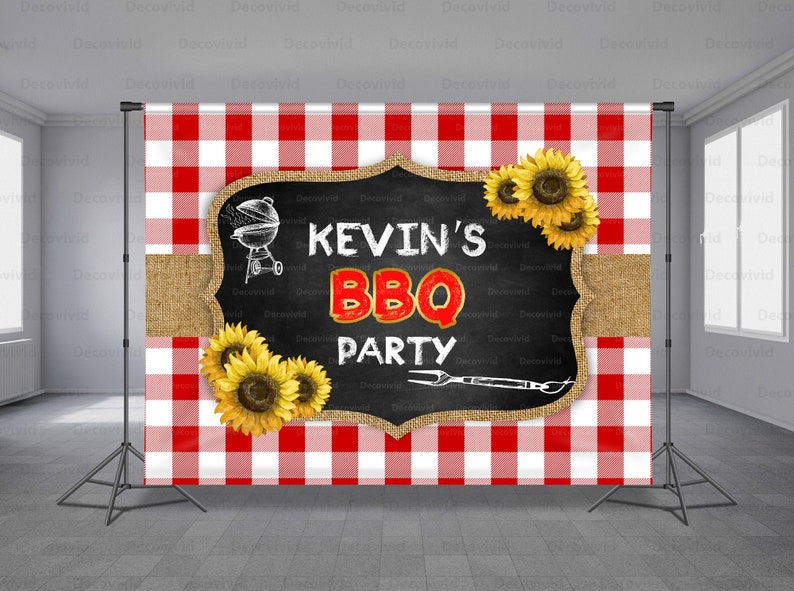 May include: A red and white checkered backdrop with a chalkboard sign that says "Kevin's BBQ Party". The sign is decorated with sunflowers and a drawing of a grill.