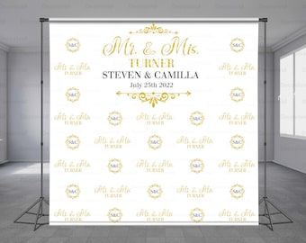 May include: White backdrop with gold text and designs. The text reads "Mr. & Mis. TURNER STEVEN & CAMILLA July 25th 2022". The backdrop is decorated with repeating patterns of "S&C" and "Mr. & Mis. TURNER".