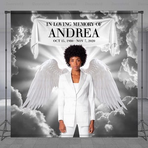 May include: A black and white photo backdrop featuring a woman with angel wings standing in front of a cloudy sky. The banner reads "In loving memory of Andrea Oct 15, 1980 - Nov 7, 2020".