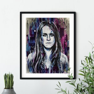 May include: A painting of a woman with long dark hair. The background is a mix of blue, purple, and gray colors with splatters of paint.