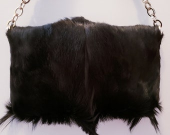 Black Springbok Hide Clutch: Leather Chain Strap Handbag