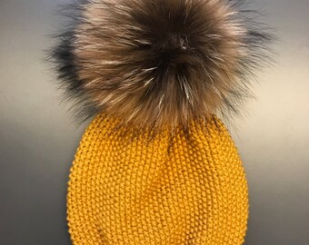 Merino wool hat with a real fur pompon