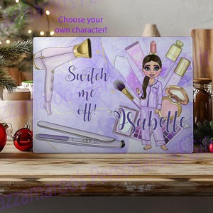 May include: Purple and white chopping board with a cartoon girl in pyjamas, a hairdryer, a flat iron, and makeup. The text "Switch me off!" and the name "Isabelle" are on the board.