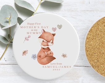 May include: White ceramic coaster with a watercolor illustration of a fox mom and baby fox. The text reads "Happy First Mother's Day as my Mummy Love from Samuel James 2022".