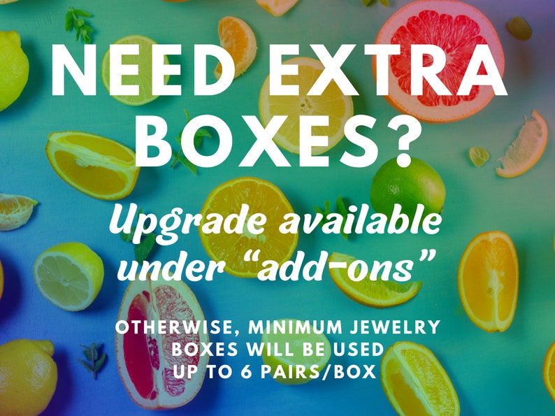 May include: A blue background with a variety of citrus fruits, including oranges, lemons, limes, and grapefruits. The text "NEED EXTRA BOXES? Upgrade available under "add-ons" OTHERWISE, MINIMUM JEWELRY BOXES WILL BE USED UP TO 6 PAIRS/BOX" is written in white.