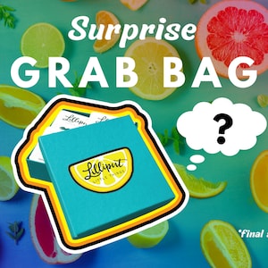 May include: A teal blue box with a yellow and black border, featuring the text "Lilliput Little Things" and a yellow lemon slice. The box is surrounded by a question mark in a white thought bubble and a background of yellow and red citrus fruit slices on a turquoise surface. The text "Surprise Grab Bag" is at the top of the image and "Final Sale" is at the bottom.