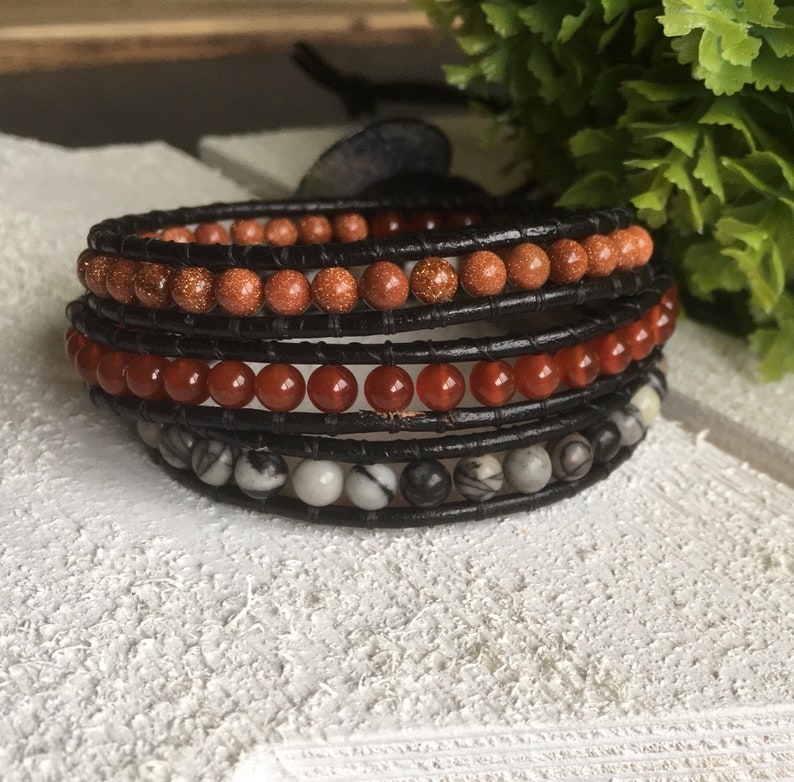 2mm black leather wrap multi-frame wrap bracelet and semi-precious 4mm Jasper black Carnelian and golden brown stone.