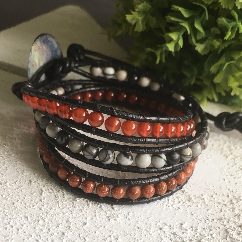 2mm black leather wrap multi-frame wrap bracelet and semi-precious 4mm Jasper black Carnelian and golden brown stone.