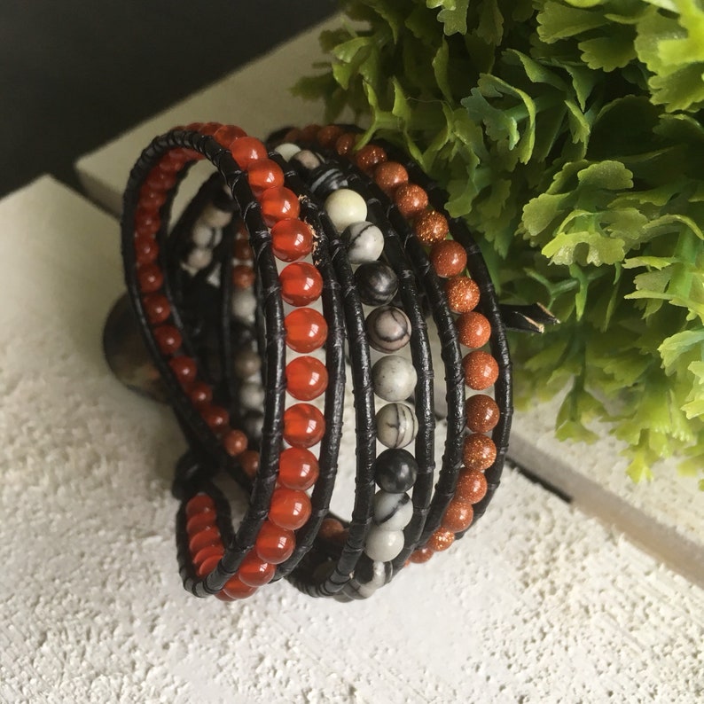2mm black leather wrap multi-frame wrap bracelet and semi-precious 4mm Jasper black Carnelian and golden brown stone.
