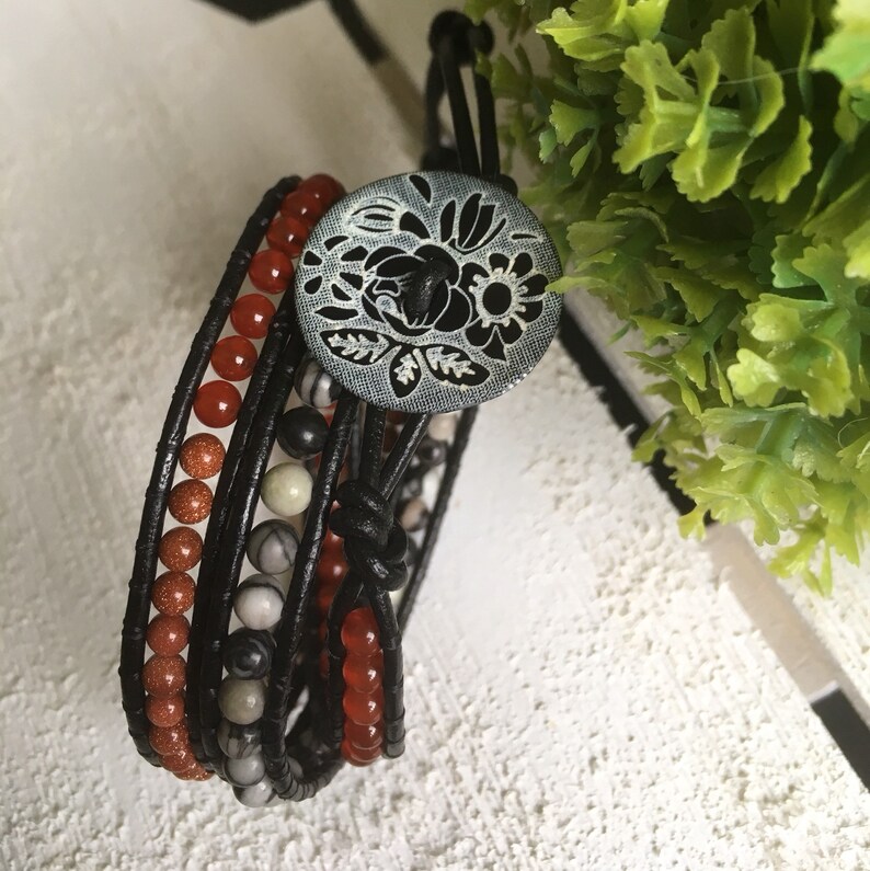 2mm black leather wrap multi-frame wrap bracelet and semi-precious 4mm Jasper black Carnelian and golden brown stone.