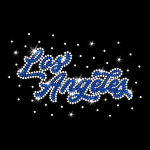 May include: Black background with the words "Los Angeles" spelled out in blue and white rhinestones. The rhinestones sparkle, and there are white dots scattered around the text.
