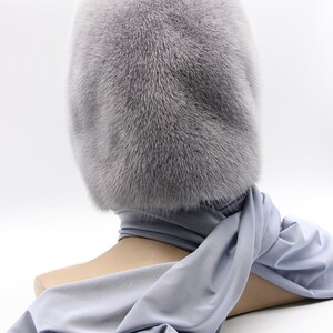 Alternative draping mink fur stole - hooded scarf styling option, winter fur accessory demonstrating multiple wearing methods