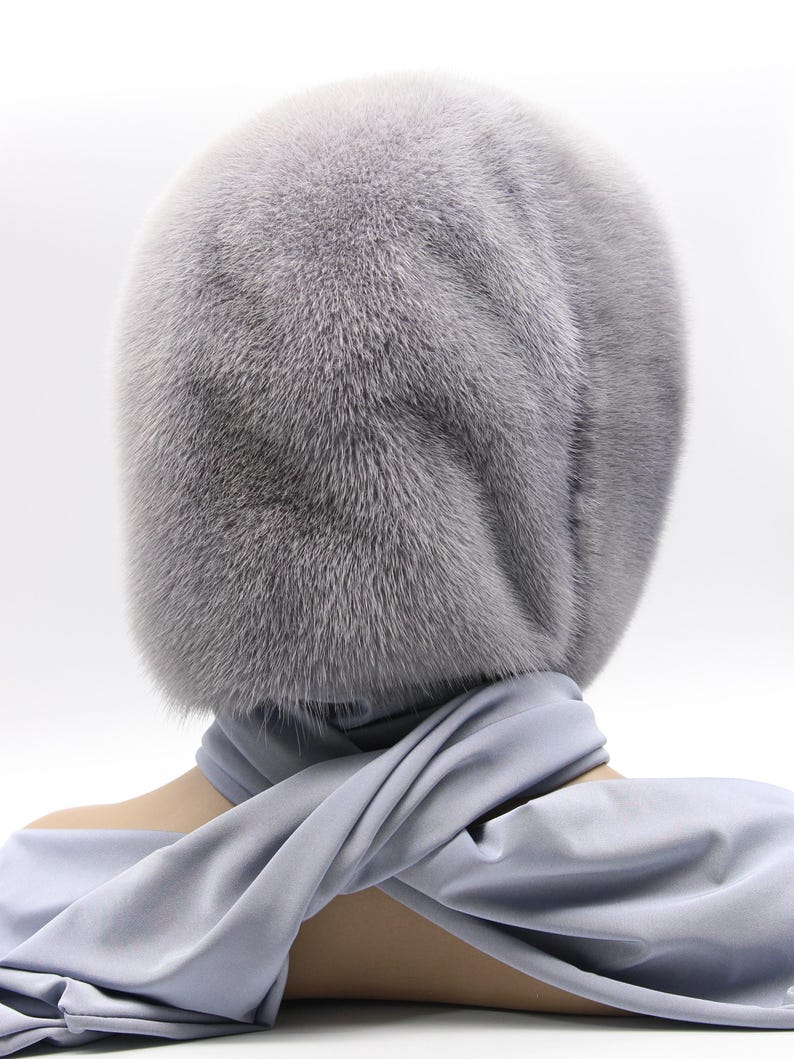 Folded view sapphire mink hood - compact fur head scarf presentation, handcrafted hood wrap showing portability and luxury finish