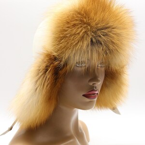 Three quarter view red fox fur hat white leather ushanka on model - luxury winter trapper handmade