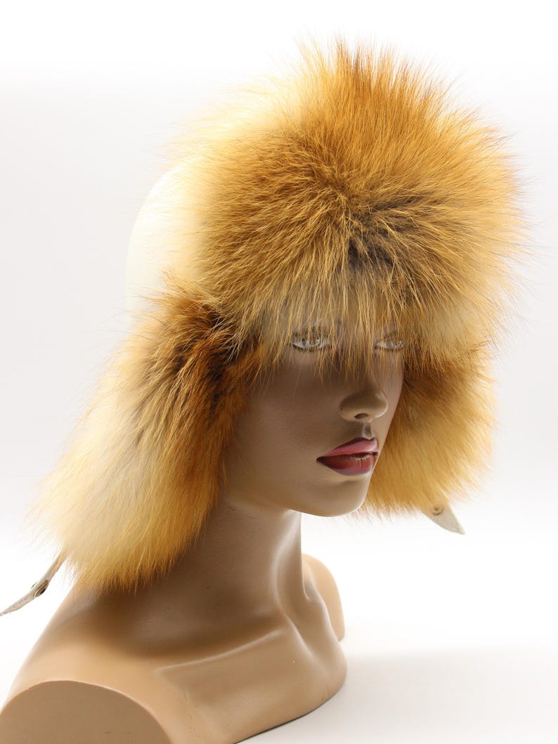 Three quarter view red fox fur hat white leather ushanka on model - luxury winter trapper handmade