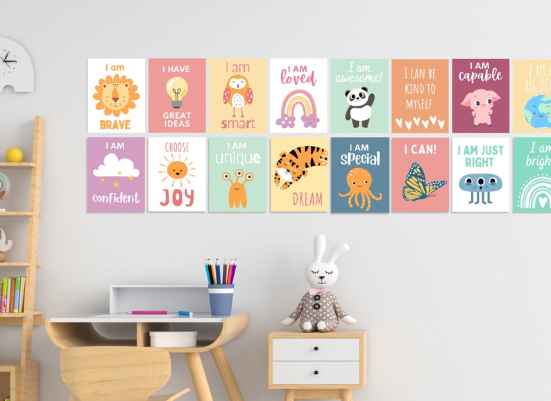 May include: A set of 12 colourful affirmation posters featuring various animals, objects, and positive messages. The posters are printed on a white background with a light pink, light blue, light green, and yellow colour scheme. The posters include messages such as "I am brave", "I am loved", "I am special", "I am unique", "I am capable", "I am just right", "I can be kind to myself", "I can!" and "Choose Joy".