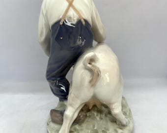 Royal Copenhagen Figurine, Farmer Boy With a Pig, Large Figurine
