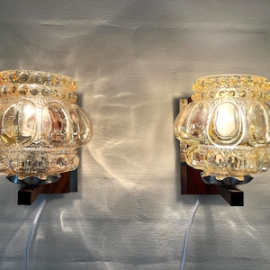 Helena Tynell wall Lights, set of two Sconces designed by Helena Tynell, produced for Glashütte Limburg, Germany 1960s.
