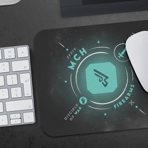May include: A black mouse pad with a white circle design featuring the text "FFXIV MCH DISCIPLE OF WAR FIREARMS" and a teal icon of a stylized arrow.
