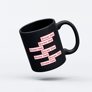 May include: Black ceramic coffee mug with the words "Divine Orb" repeated six times in red.