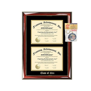 May include: A mahogany-colored frame with a gold trim, displaying two diplomas with black backgrounds and gold lettering. The diplomas are for "Framing Achievement, Inc." and feature the text "Class of 20xx". A small keychain with a red, white, and blue design is included.