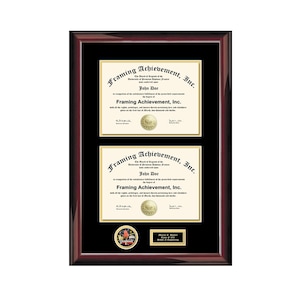 May include: A framed diploma with a gold seal and a black plaque with the text "Marvin C. Henley School of Engineering". The diploma is for "Framing Achievement, Inc." and is awarded to "John Doe".
