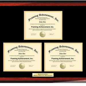 May include: A triple diploma frame with a mahogany finish. The frame has three openings for diplomas, each with a gold mat and a black background. The frame is decorated with a gold seal and the text "Framing Achievement, Inc." The bottom of the frame has a personalized nameplate with the text "Personalized Name, Master of Business Administration".