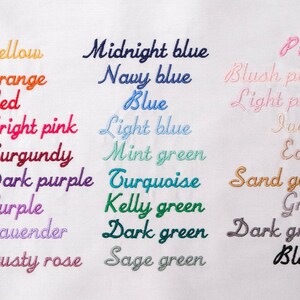 May include: A chart of embroidered thread colors with names in cursive script. The colors include yellow, orange, red, bright pink, burgundy, dark purple, purple, lavender, dusty rose, midnight blue, navy blue, blue, light blue, mint green, turquoise, kelly green, dark green, sage green, pink, blush pink, light pink, ivory, ecru, sand gold, gray, dark gray, and black.
