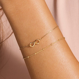 Geschenk oneindigheidsarmband, armband zus moeder cadeau, vrouw sieraden cadeau, gouden oneindigheidsarmband, sierlijke gekoppelde oneindigheidsarmband, zilver