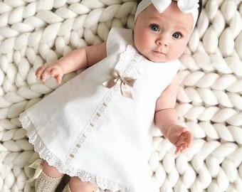 cute baby in white dress