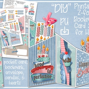 May include: Printable DIY Z-fold bookmark card set with a blue and pink color scheme. The card features a cupcake, candles, and a cake with the text "aged to perfection". The card also includes the text "Happy Birthday".