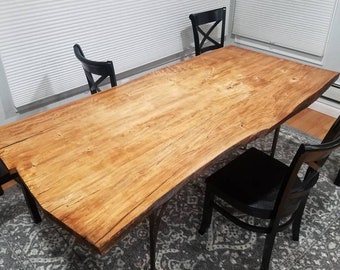 Mesa de comedor de borde vivo