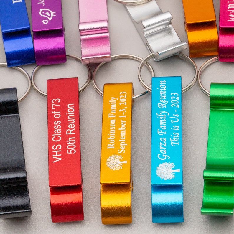 family reunion favors Custom Keychains Bottle Opener. Wedding Favors, Quinceanera, Bridal Baby Shower, Beer Openers. Personalized Keychains Reunion on a table