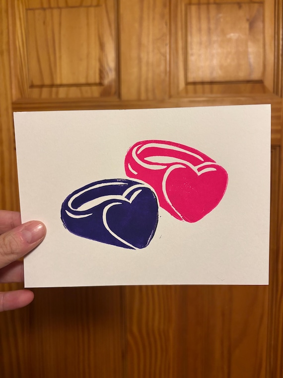 Long Game Plastic Heart Rings Linocut Print | Heated Rivalry