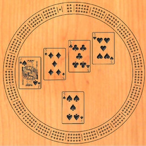 May include: A wooden cribbage board with a circular playing surface and a set of five playing cards. The cards are all fives, and they are arranged in a circle around the center of the board. The board is made of light wood and has a dark brown stain.