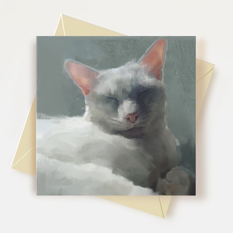 May include: A white cat with pink ears is sleeping with its eyes closed. The cat is lying on a light gray surface.