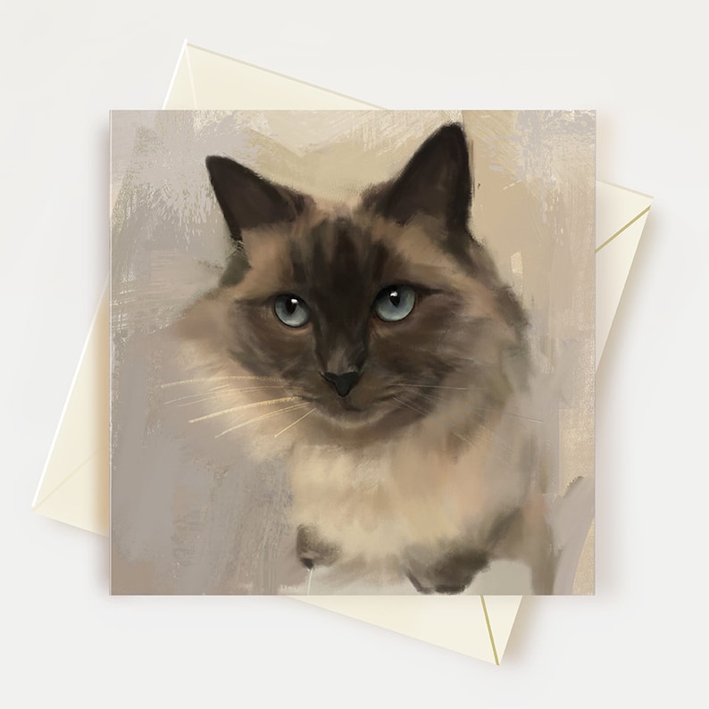 May include: A close-up portrait of a Siamese cat with blue eyes. The cat has a light brown and white coat and is looking directly at the camera.