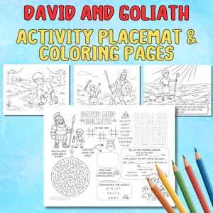 May include: A placemat and coloring pages set with the text "DAVID AND GOLIATH ACTIVITY PLACEMAT & COLORING PAGES". The set includes illustrations and activities like tic-tac-toe, a maze, and word puzzles. Colored pencils are visible.