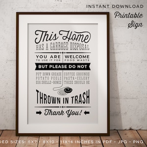 May include: Black and white printable sign that reads "This Home Has A Garbage Disposal. You Are Welcome To Use It For Food Waste But Please Do Not Put Down Grease Coffee Grounds Potato Peels Pasta Celery Egg Shells Bones These Should Be Thrown In Trash. Thank You!" The sign is framed in a black frame.