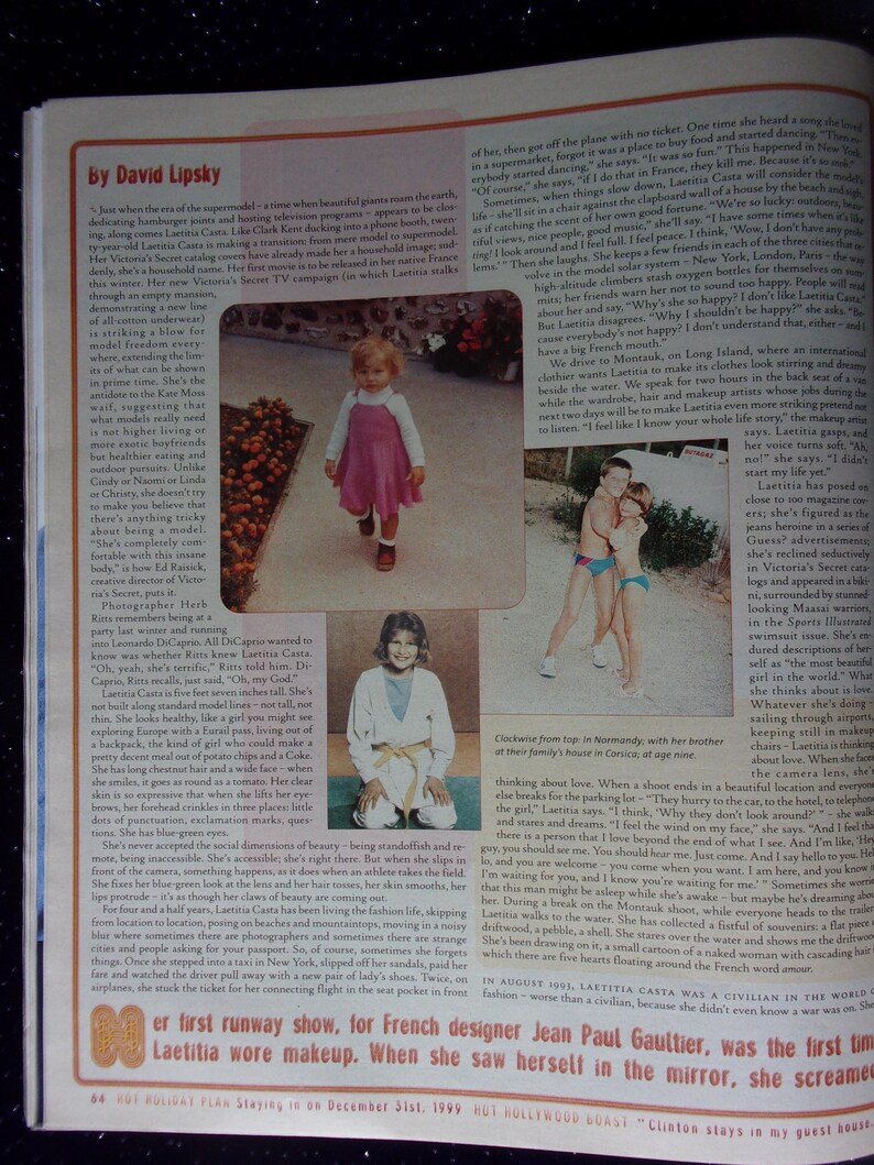 May include: A magazine article about Laetitia Casta, a French model. The article features several photos of Laetitia Casta at different ages, including a photo of her as a child wearing a pink dress, a photo of her as a teenager wearing a white karate uniform, and a photo of her as an adult wearing a black dress. The article discusses Laetitia Casta's career and her personal life.
