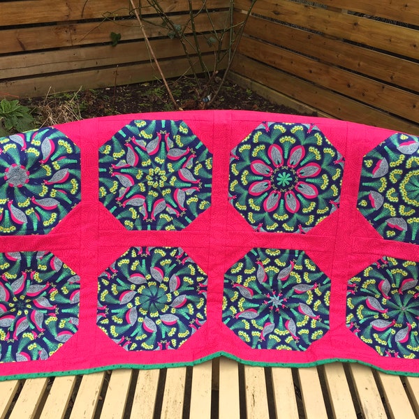 Vibrant kaleidoscope patchwork quilt