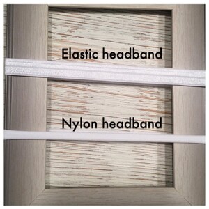 May include: Two white elastic headbands, one labeled "Elastic headband" and the other labeled "Nylon headband".