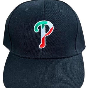 May include: Black baseball cap with a green, white, and red embroidered "P" on the front.