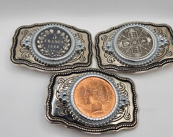 Western style belt buckles with old coins. Three styles available.